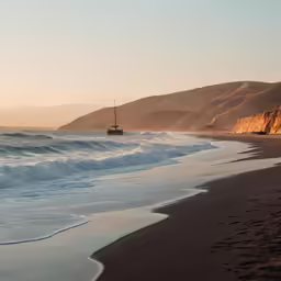 there is a boat that is at the beach