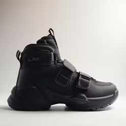 black boots with buckles and soles