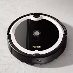 a very pretty robot sitting on top of a table