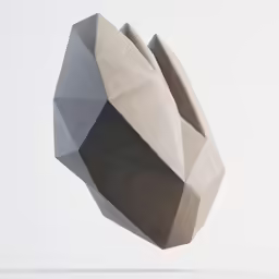 a stone statue on top of a white wall