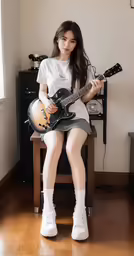 young woman sitting on top of a chair with a guitar