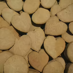 heart shaped biscuits are sitting on top of each other