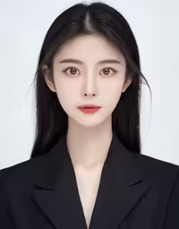 the woman in a suit looks into the camera,a close up of a woman wearing a suit