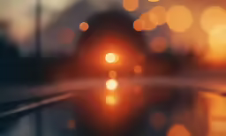 the blurry image shows lights on an automobile