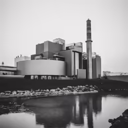 a black and white photo of a very big building