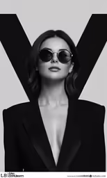 a woman wearing sunglasses with her arms around her neck