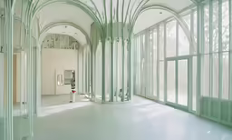 an image of an architecture exhibit with large windows