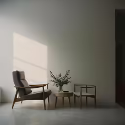 a chair and table sit in a room with white walls