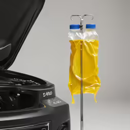yellow plastic covering an item on top of a machine