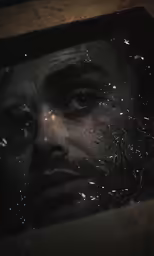 the man looks through the window as the water drops from underneath him