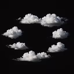 clouds form a central shape as they fly through the sky,four clouds are in the shape of a heart