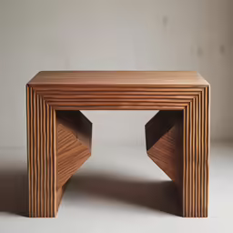 an intricate wooden bench on white ground
