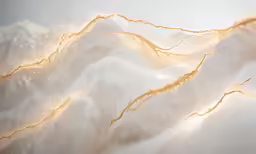 a textured image with gold and white designs