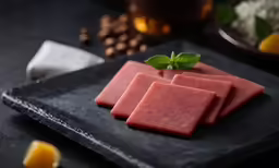 food items placed on stone plate on table