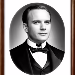 an old black and white photo of a man in a tuxedo