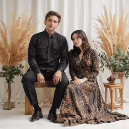 a woman and man posing for a photo