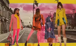 women in bright outfits on the streets of europe