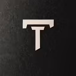this is the letter t on black paper