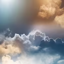a beautiful blue sky has some fluffy clouds