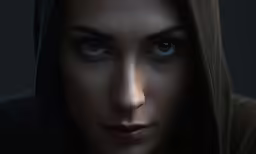 an image of a woman with a hooded face and brown hoodie