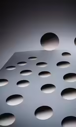 several circles placed on the table as one circles is on the top