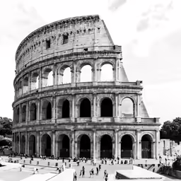 a picture of an old style structure that looks like it is in the middle of a city