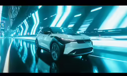 a white vehicle with black rims driving down a tunnel