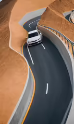a car driving on the road in an aerial view