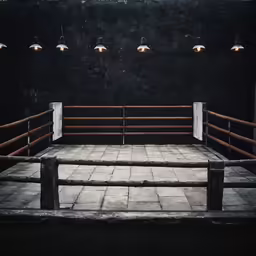 an empty wooden bench in a dark building