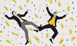 two men jumping up in the air with words all over them