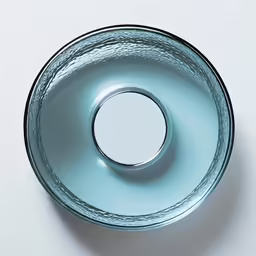 a glass filled with a liquid is sitting on the table