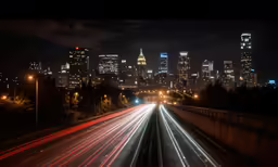 night time photo of city lights on roadway
