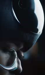 a person wearing a helmet and looking through some kind of magnifying glass