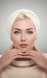 a beautiful blond lady wearing a white hat and white dress