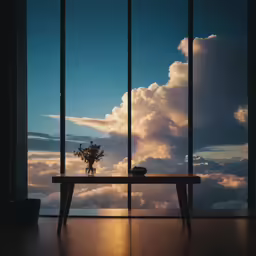 a lone vase is placed at a window sill