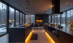 a kitchen with a center island covered in lights