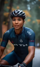 an attractive woman riding her bike through the woods