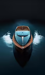 a small boat in the water with the front end facing slightly