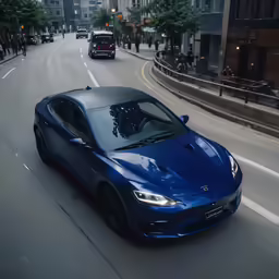 there is a blue car driving down the street