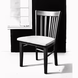 a chair that is sitting in front of a window