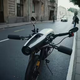 the motorcycle is parked on the street beside the curb