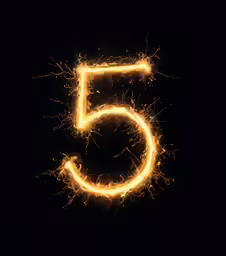 a yellow glow burning in the shape of a number five