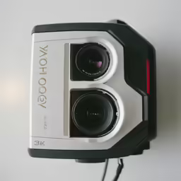 an old camera attached to a wall