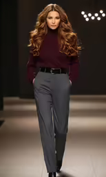 a model wearing gray pants with dark hair
