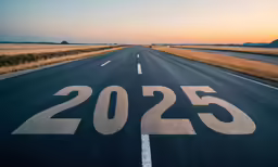 a long open highway with the number 205 painted on it