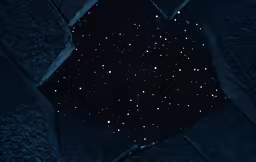 a star field with little speckles in a black background