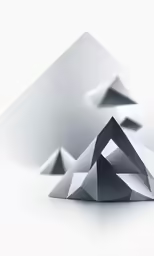 two white mountain tops against a gray sky
