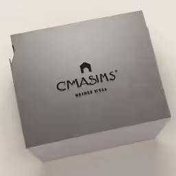 the box is silver with black lettering on it