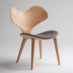 a wooden chair with black seat and back