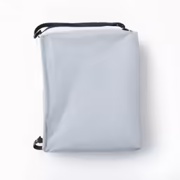 a white square bag on top of a table